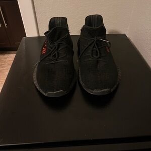 Yeezy Black and Red Sneakers